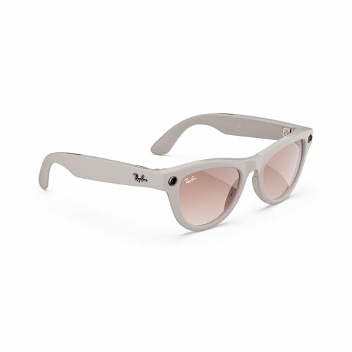 White sunglasses with pink lenses, side view.